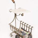 Antique magazine rack on wheels