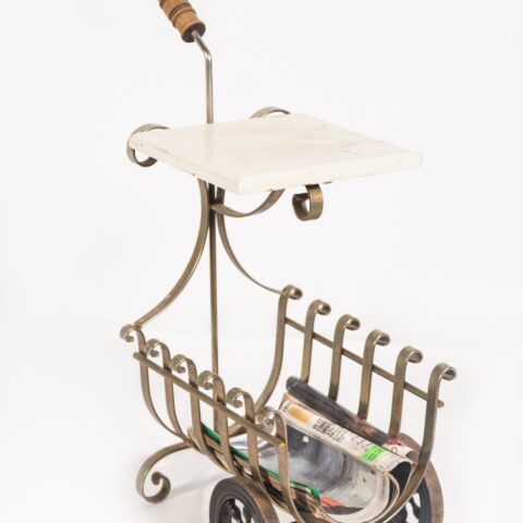 Antique magazine rack on wheels