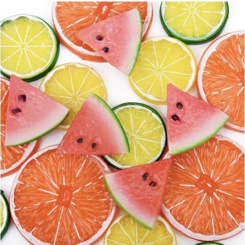Artificial plastic sliced assorted fruits