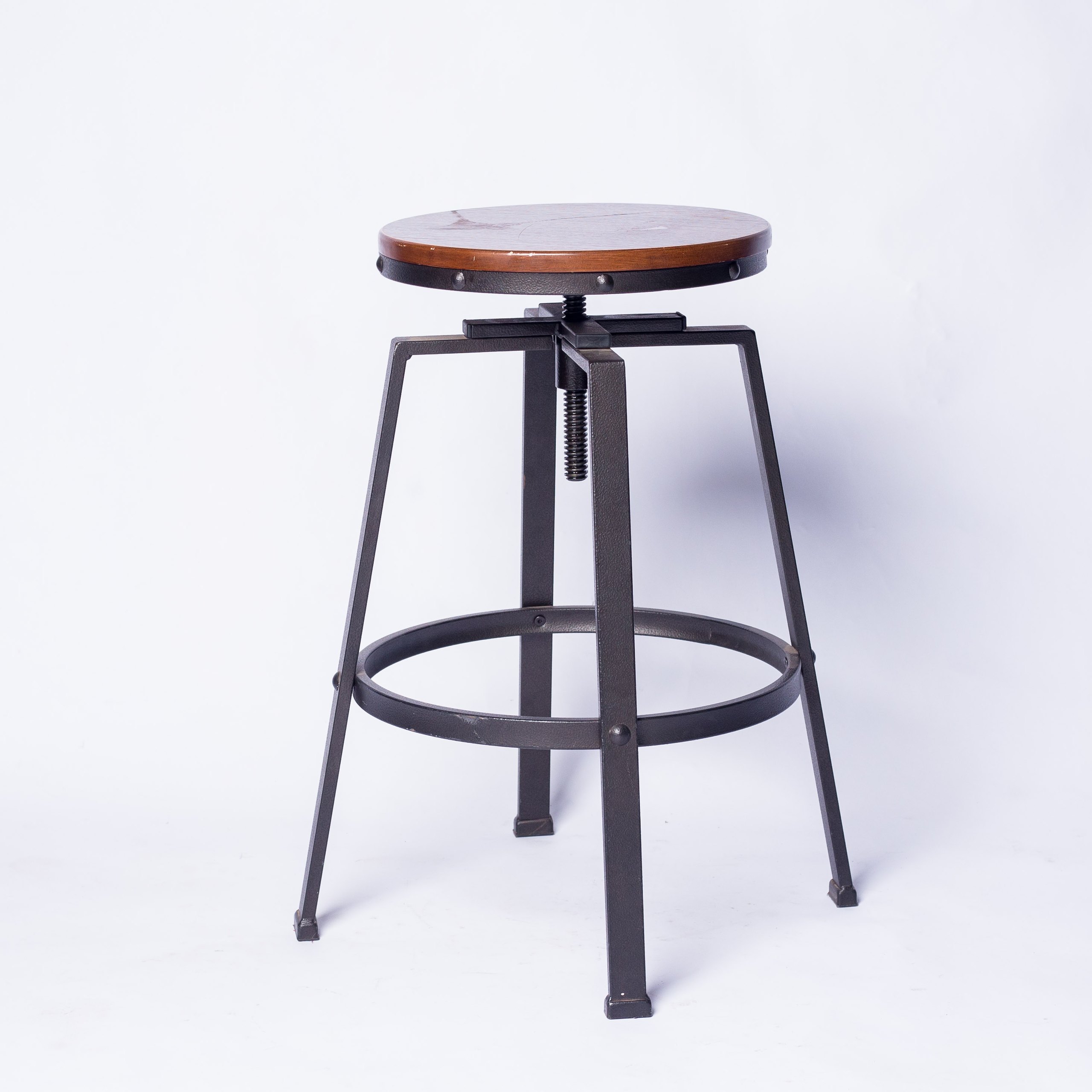 Brown swivel bar stool