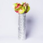Lace leaf with silver vase