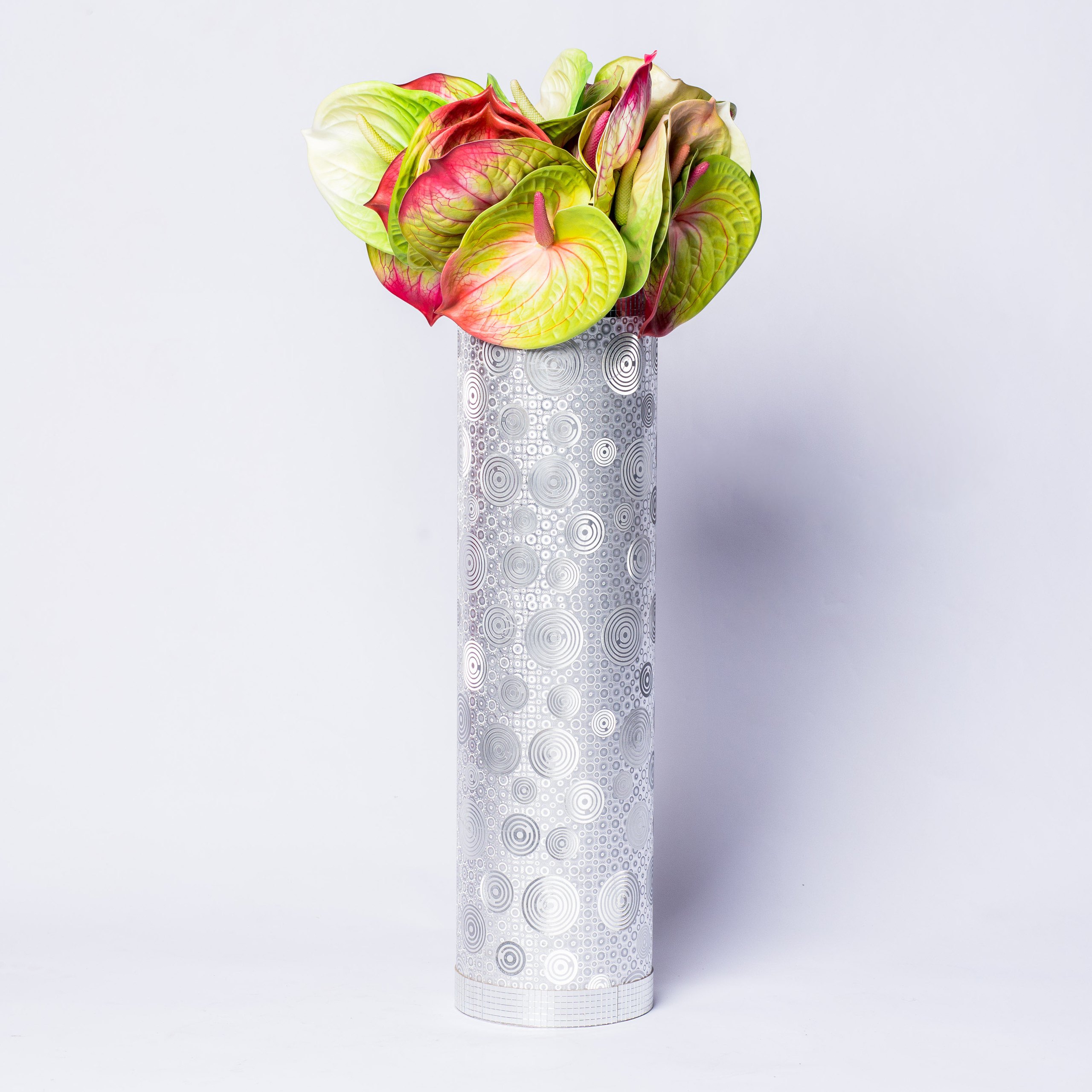 Lace leaf with silver vase