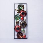 Mirror spirals plaques