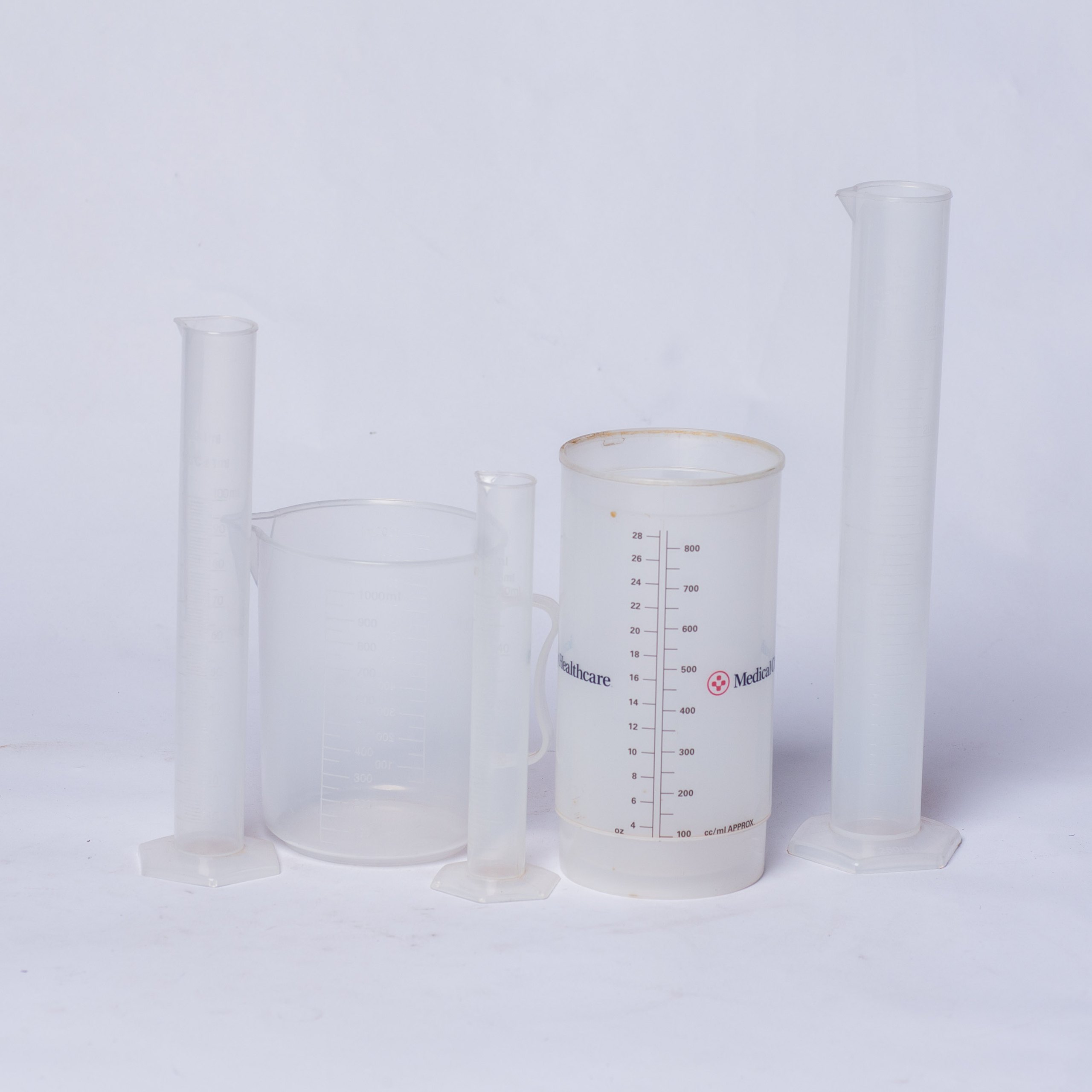 Sets of plastics beaker and cylinders