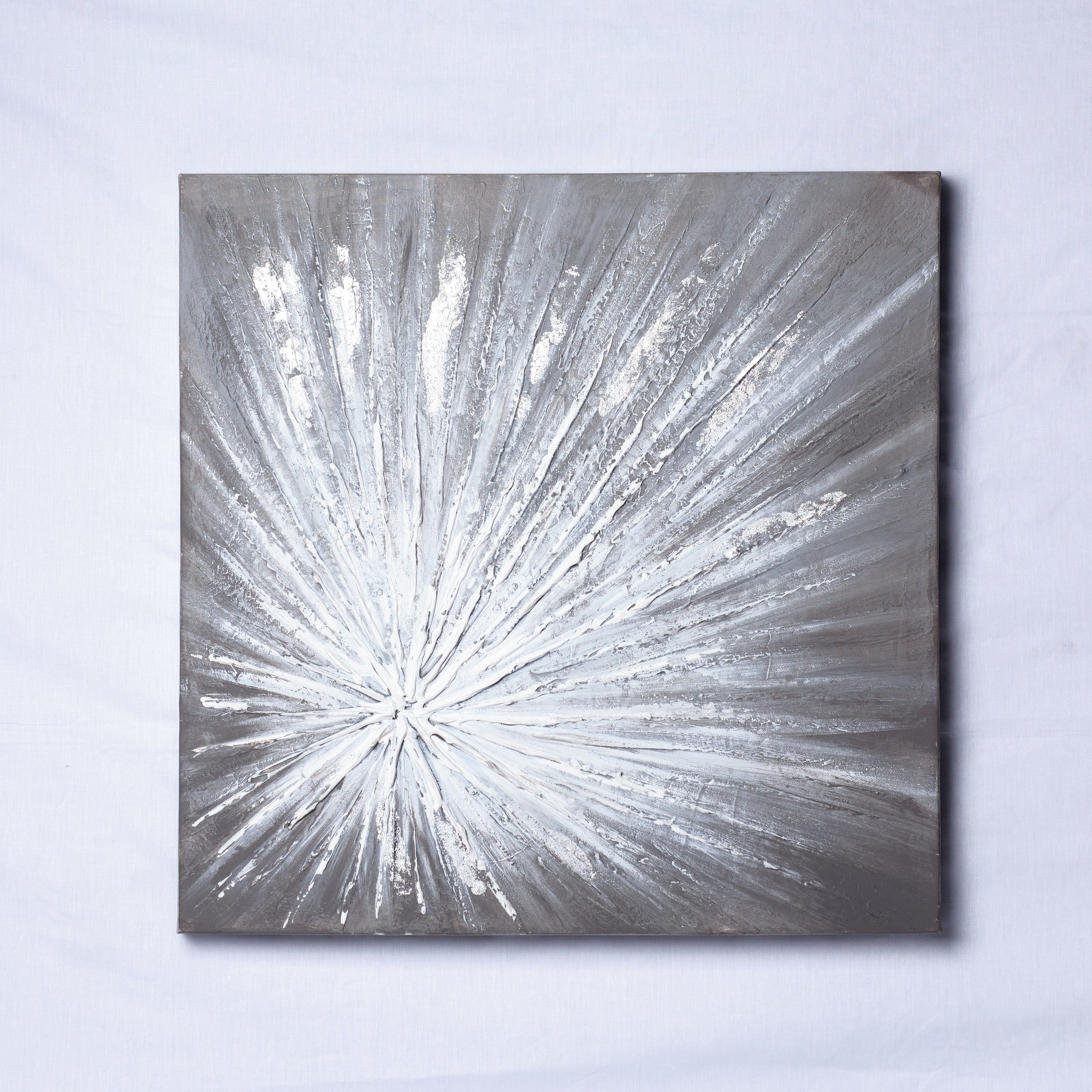 Silver star burst wall hanging