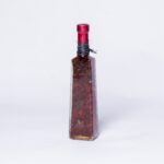 Sliced marinated pepper in bottle
