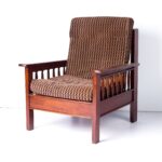 Teak lounge chair with cushions