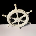 White washed ship wheel