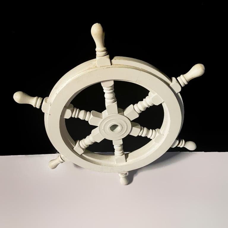 White washed ship wheel